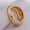Gold curve bracelet